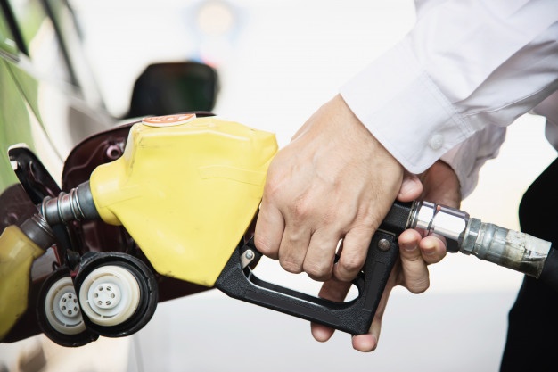 Man Putting Gasoline Fuel Into His Car Pump Gas Station 1150 14574