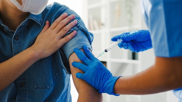 Young Asian Lady Nurse Giving Covid 19 Flu Antivirus Vaccine Shot Senior Male Patient 7861 2845