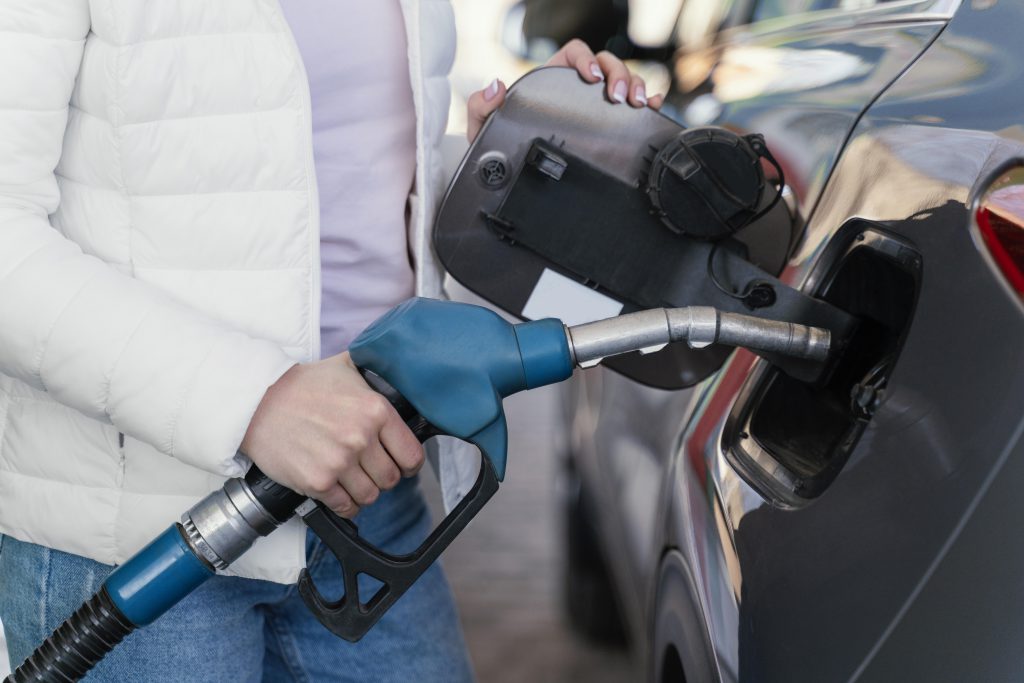 Woman Filling Up Car Gas Station 1
