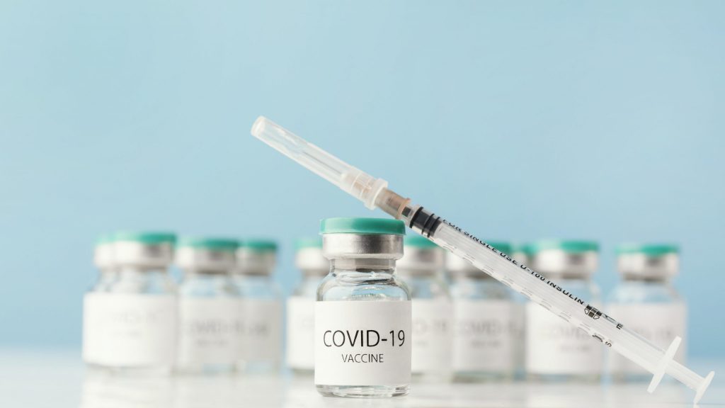 Arrangement With Coronavirus Vaccine Bottle Scaled 1